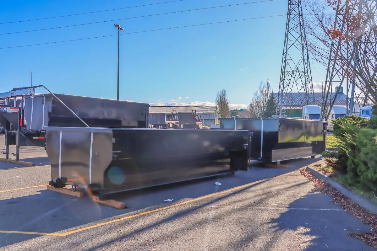 Roll-off dumpster ready for waste disposal at job site for Roofing Dumpster Rental in Great Barrington